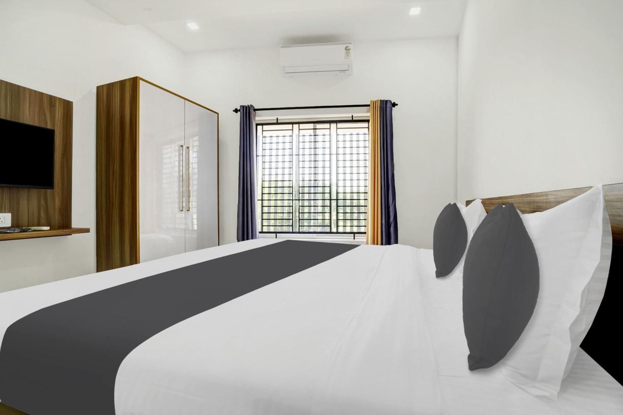 Hotel O Grand Parassini Pappinisseri Экстерьер фото