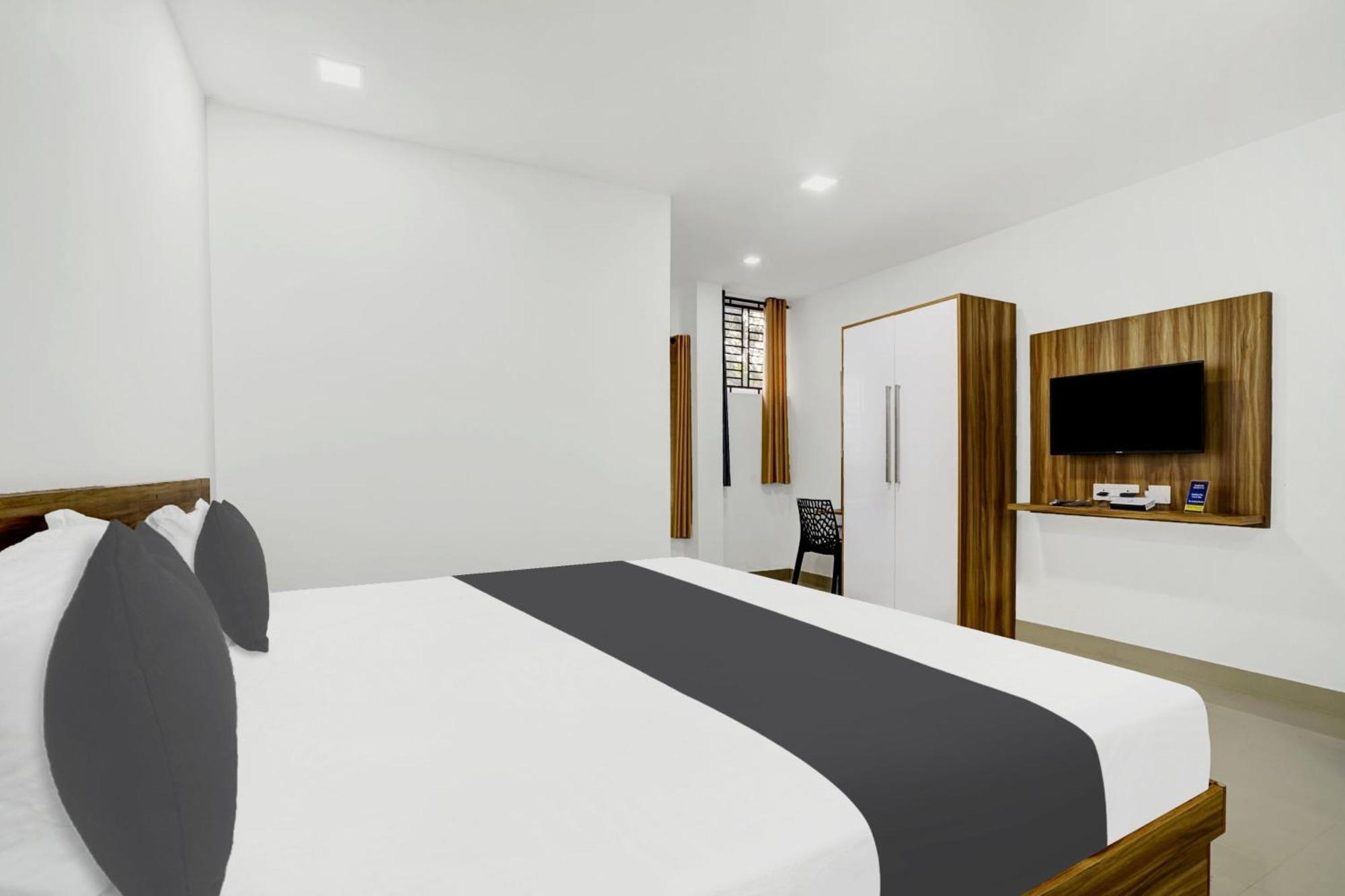 Hotel O Grand Parassini Pappinisseri Экстерьер фото