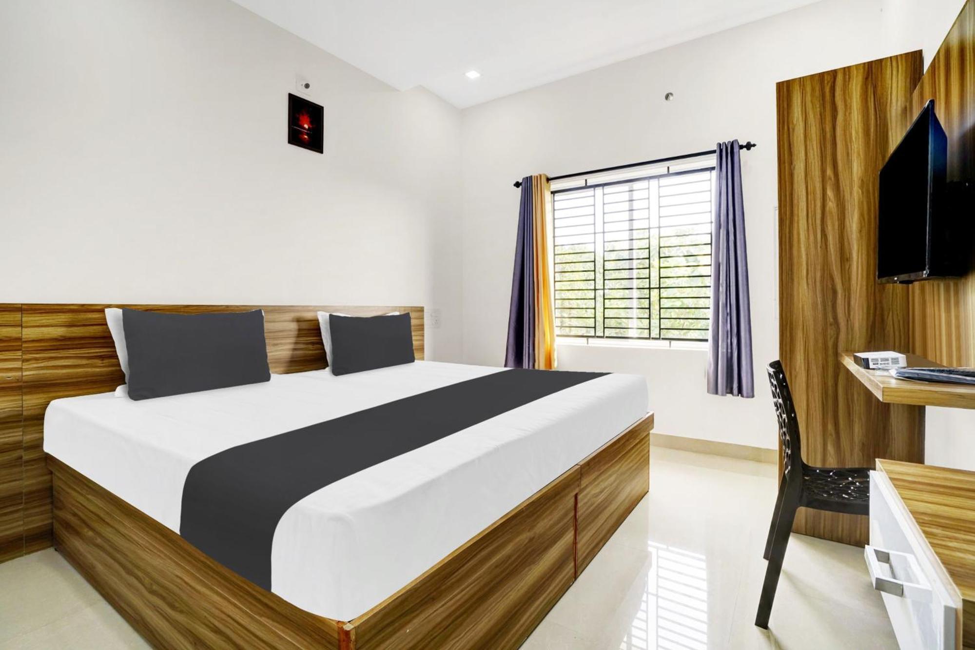 Hotel O Grand Parassini Pappinisseri Экстерьер фото